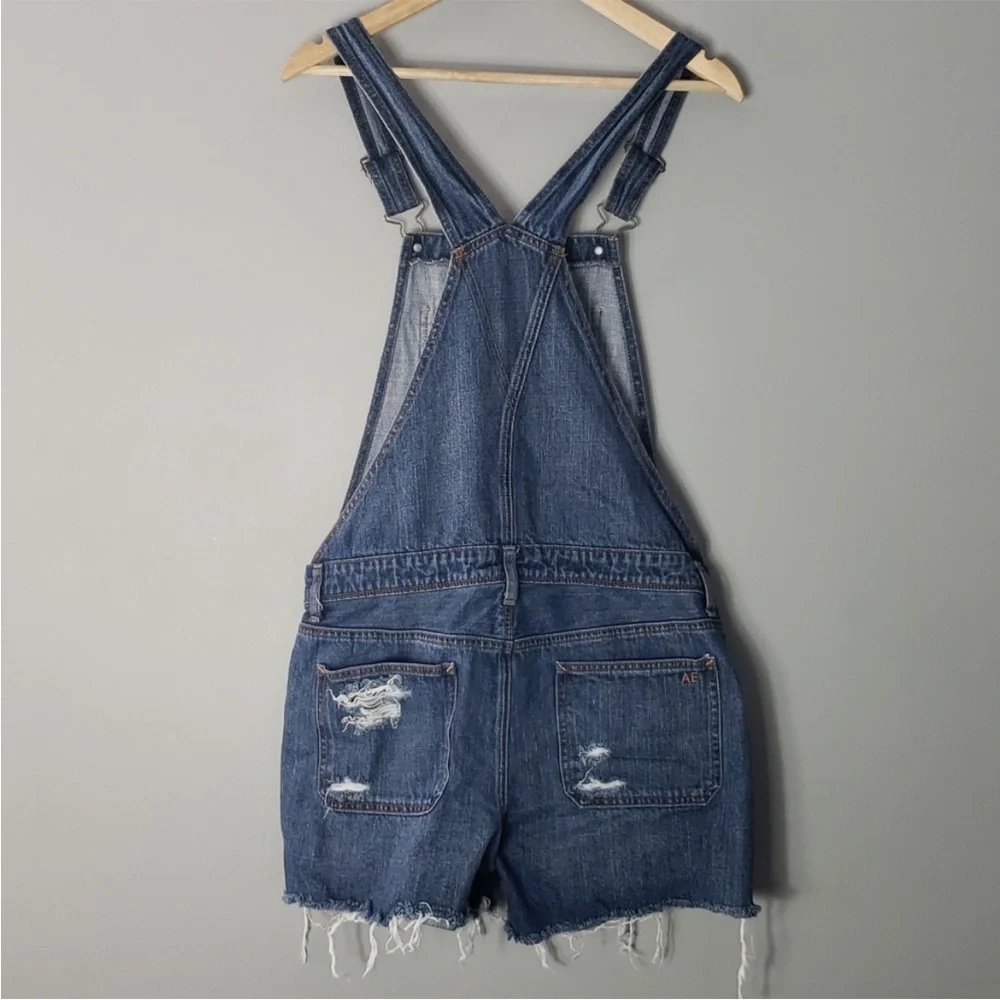 American Eagle Distressed Tomgirl Shortall Denim
Overalls in Medium Wash, Small - Picture 4 of 6
